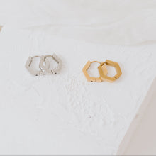 Load image into Gallery viewer, These are the geometric hexagon earrings you will want for everyday wear. Leave them on and forget it. Do not worry if you forget to change them or take them. These are the waterproof earrings you will love. Not only are they tarnish resistant, they are also hypoallergenic making it safe for anyone to wear.