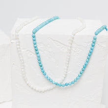Load image into Gallery viewer, It is believed to bring peace, positive energy, and balance emotions. It is sometimes used during meditation to connect with inner power. It brings calm to regulate energy. These Turquoise Beaded Necklaces are perfect to incorporate with your layered looks.