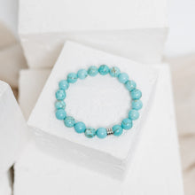 Load image into Gallery viewer, Turquoise reminds us to stay grounded, while aspiring to explore the vast heavens of our existence. Whether worn as jewelry, used in meditation, or simply kept as a talisman, turquoise continues to shine as a symbol of immortality, courage and true friendship.