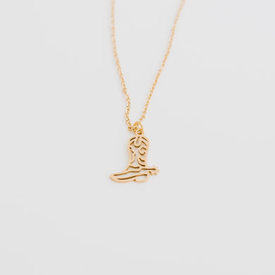 This cowgirl boot necklace is perfect for all those cowgirls events or those who live the lifestyle all day everyday.  With outline details including a spur, this accessory is the idea statement to let everyone know your are a cowgirl at hear. This necklace comes in silver and gold. It is waterproof, tarnish resistent, hypoallergenic and cute as hell.