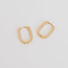 Load image into Gallery viewer, These are the geometric oval earrings you will want for everyday wear. Leave them on and forget it. Do not worry if you forget to change them or take them. These are the waterproof earrings you will love. Not only are they tarnish resistant, they are also hypoallergenic making it safe for anyone to wear.
