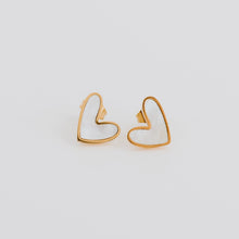 Load image into Gallery viewer, The cutest heart earrings. With a shell inlay to give them that pearly sheen look. Perfect earrings for any age. They are hypoallergenic, tarnish resistant due to being 18k gold pvd stainless steel base.
