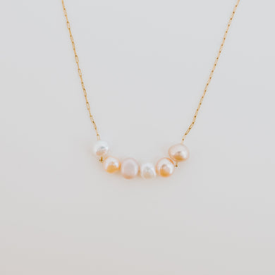 Multicolored pearl necklaces with colors of blush, beige, pink and white fresh waterpearls, there's no denying how delicate and feminine this necklace is. 